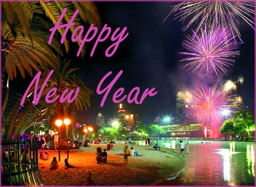 Modern%20Happy%20New%20Years%20Card:%20Pink%20fireworks%20at%20the%20beach.