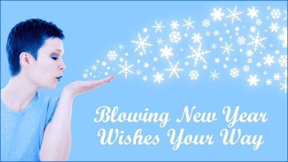Light blue New Year Greeting Card: Woman blowing wishes, small snowflakes.