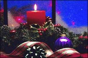 Photo of Christmas decoration and red Christmas candle burning