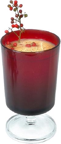 Good Christmas Sayings: Photo of eggnog in red glass.