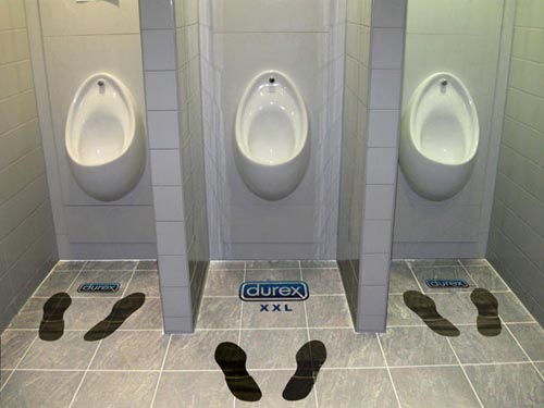 Durex funny ads: Durex xxl - footprints in toilet