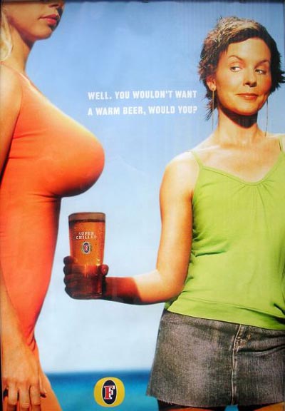 Foster's beer ads - Woman holding her beer under another woman's breast for the cooling shadow effect.