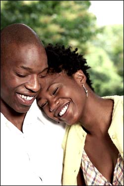 Funny birthday greetings: Happy couple. Woman leaning her head or her boyfriend's shoulder.