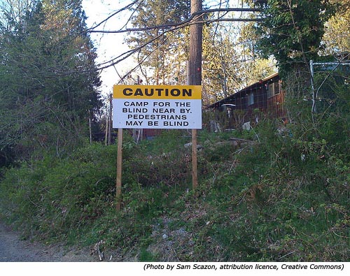 Really funny road signs and warning signs: Caution! Camp for the blind near by. Pedestrians may be blind!