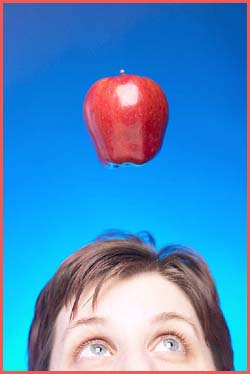 Limits are not real: Apple flying above man's head.
