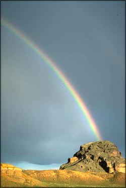 Picture of rainbow in the desert.