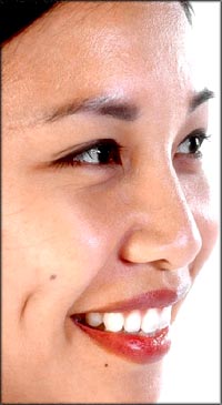 Positive quotes: Profile of Asian woman smiling.