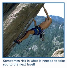 Man climber taking a risk climbing up steep rock!