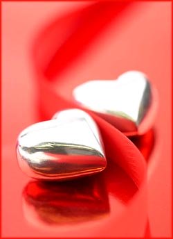 Happy birthday quotes: Cute silver hearts on red background.