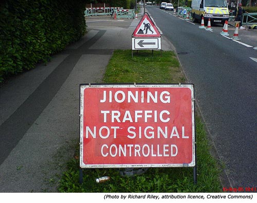 Silly signs and funny road work signs: Jioning Traffic Not Signal Controlled!