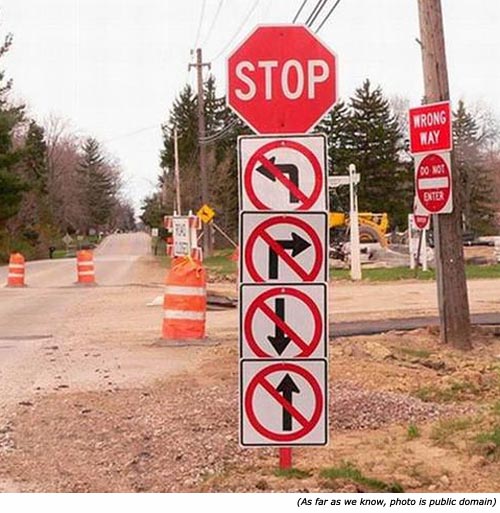 Hilarious signs and funny traffic signs: STOP. No left turn. No right turn. No going back. No going forward.