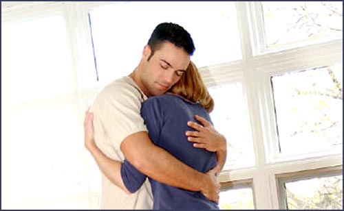 Man and woman hugging. Couple embracing.