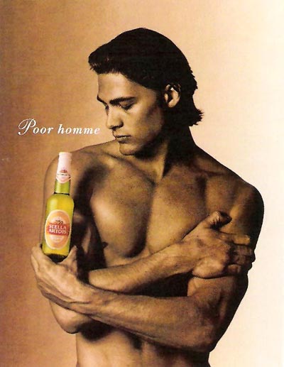Stella Artois beer ads - Pour Homme - man holding bottle like a perfume.
