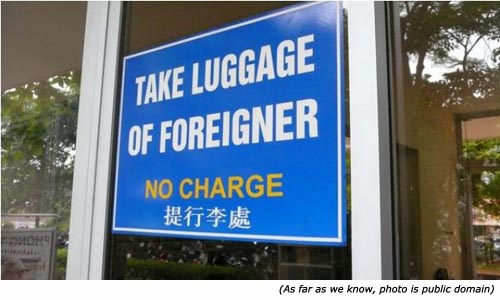 Funny airport signs: Take luggage of foreigner. No charge!