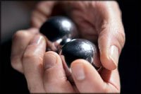 Unusual gifts for your man: Stress balls in silver.