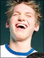 Funny unusual gifts: Photo of young man laughing.