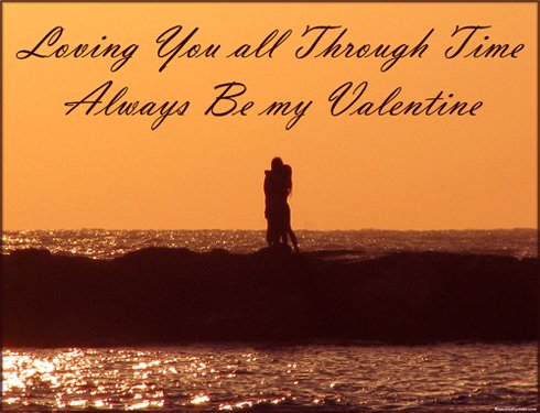 Free Valentine Card: couple hugging at the beach in an orange sunset.