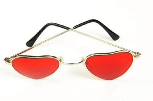 The meaning of Valentines Day: Red heart shaped glasses.